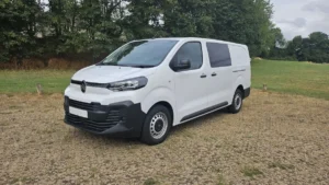 A white commercial van parked on a gravel surface, representative of the vehicles involved in the Cheshire East fraud case.