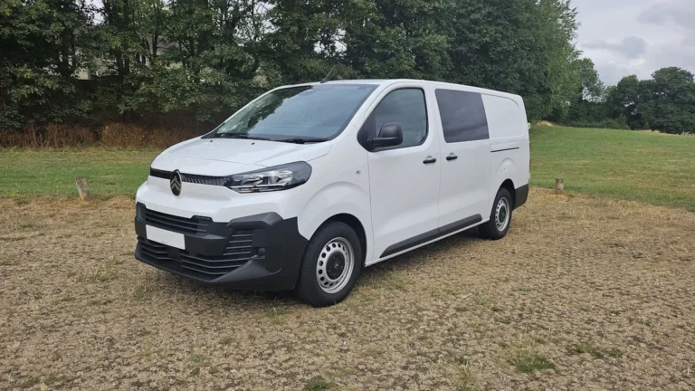 A white commercial van parked on a gravel surface, representative of the vehicles involved in the Cheshire East fraud case.