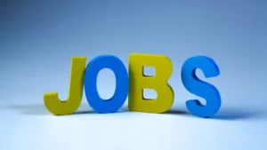 3D letters spelling out the word JOBS in blue and yellow against a blue background.