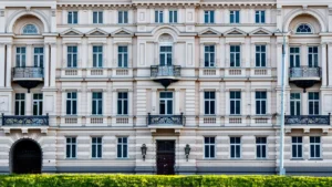 The neoclassical facade of a grand building in Vilnius, Lithuania, representing the country's financial and legislative institutions.