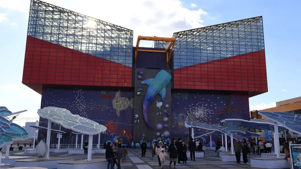 Modern public building with colorful mural suitable for family community events in London.