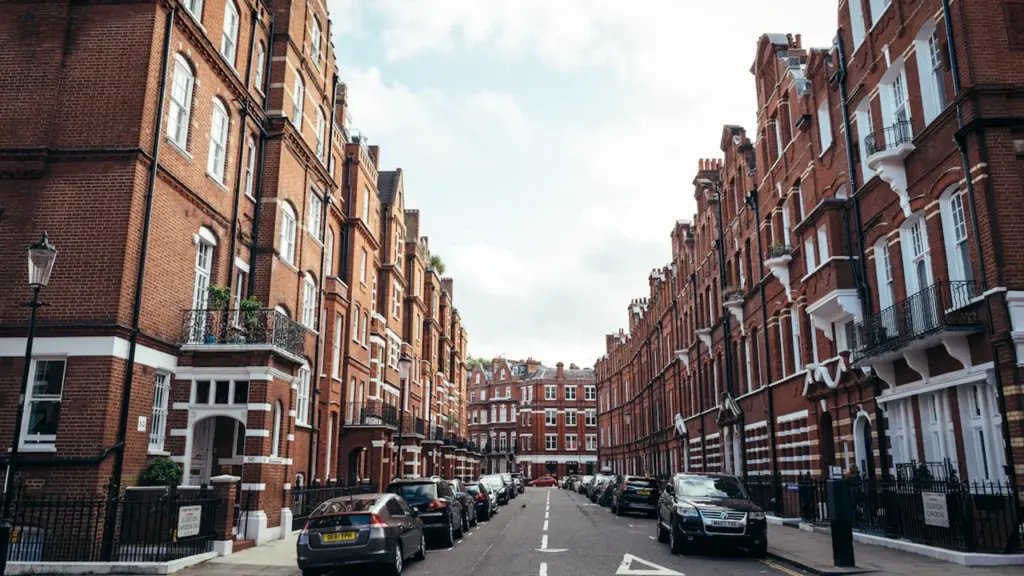 Classic Victorian brick residential street in London, typical of suburban family housing areas.