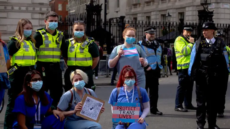 NHS healthcare workers participating in a public demonstration in central London.